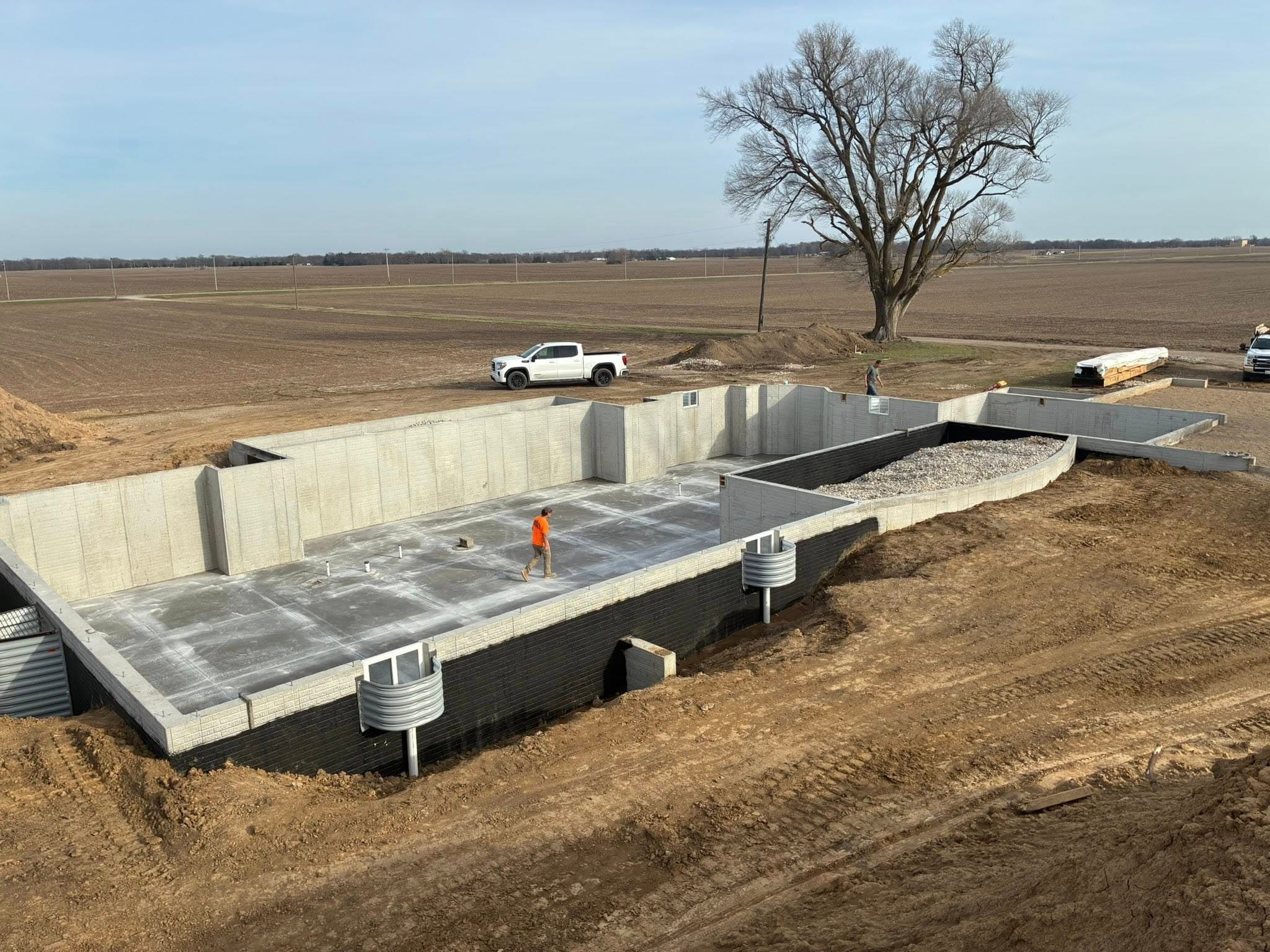 Aerial view of freshly poured concrete foundation and flatwork by S&T Concrete, Fairbury IL
