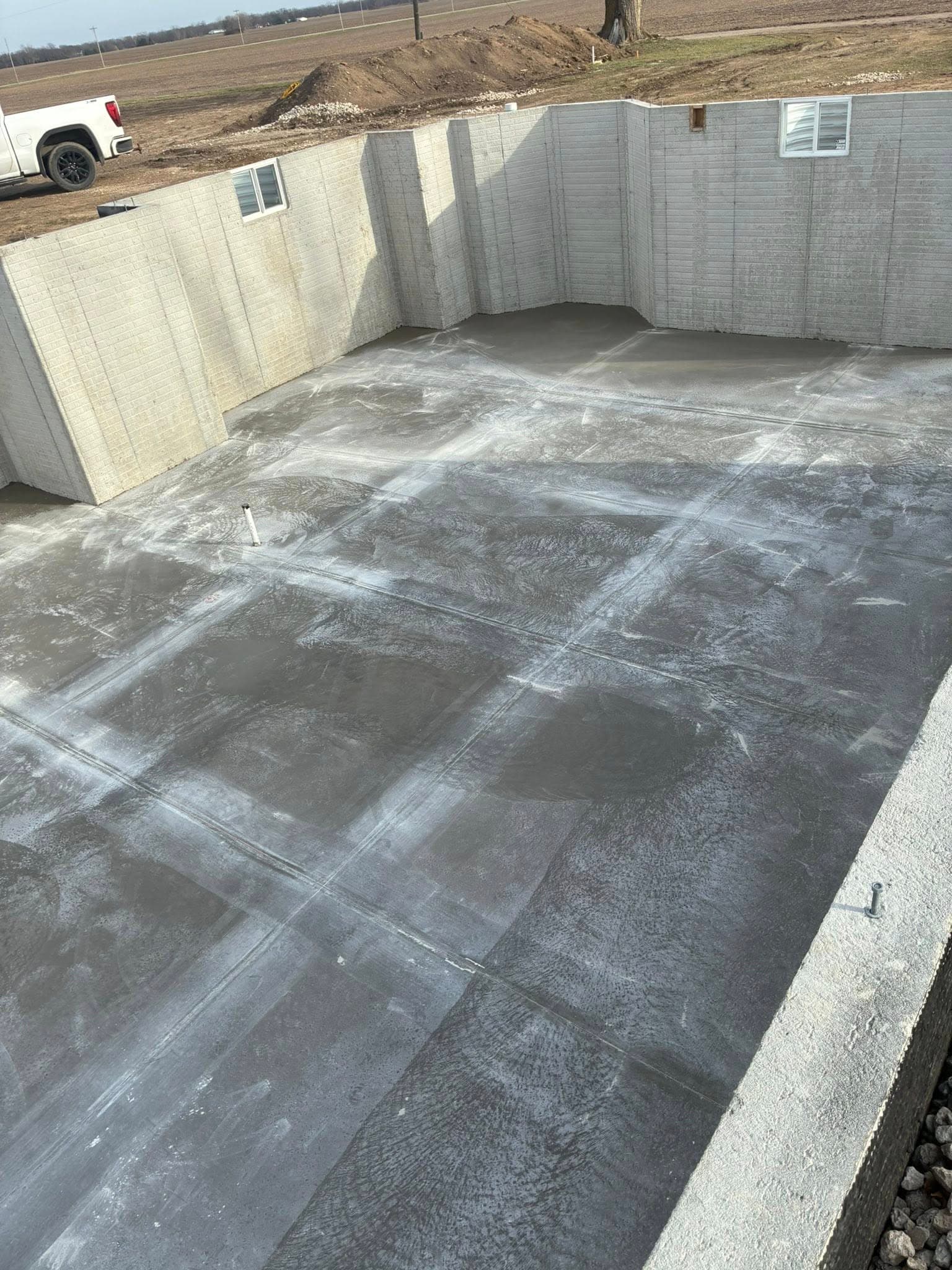 Close-up of finished concrete slab surface showing clean flatwork by S&T Concrete